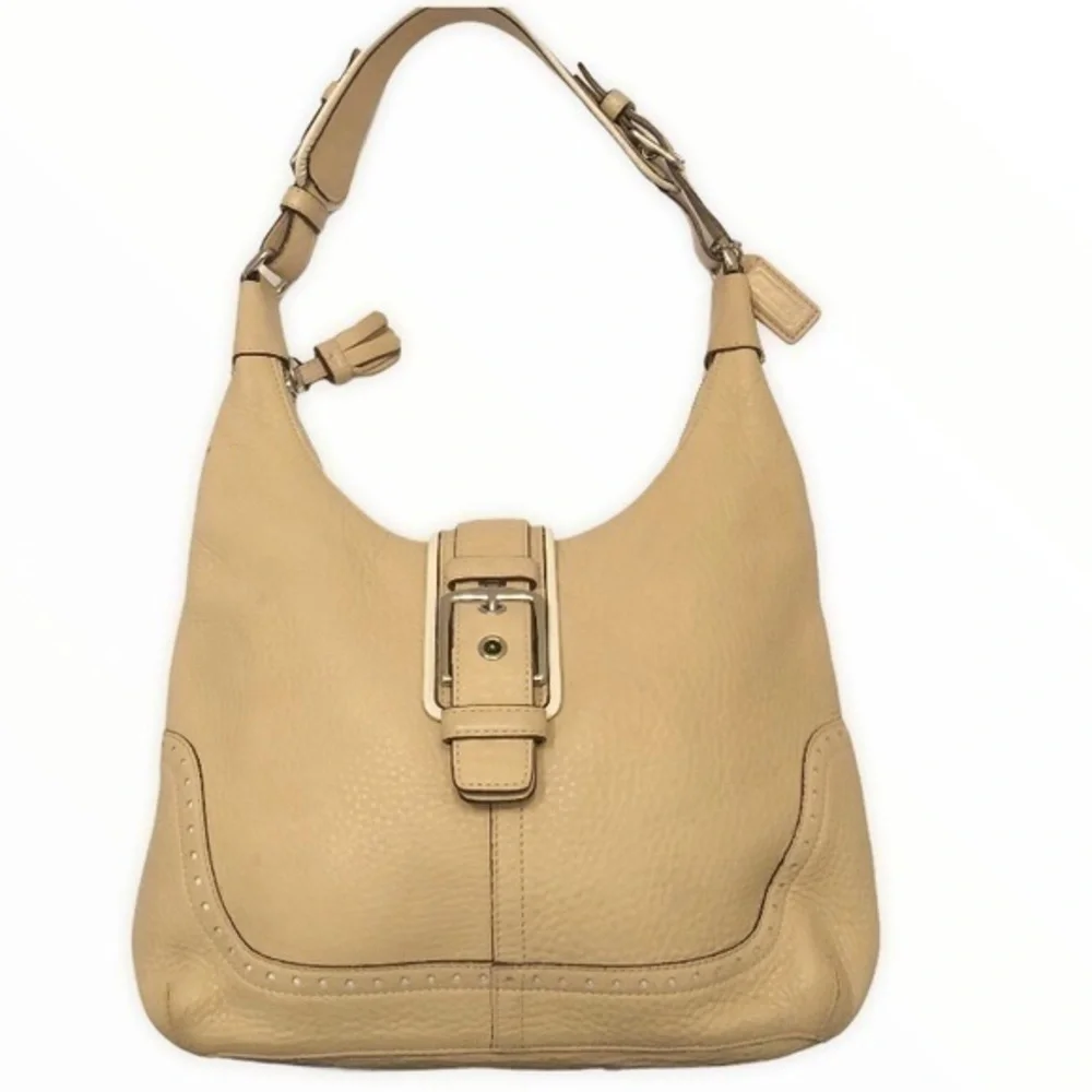 Coach cream pebbled leather perforated hobo bag